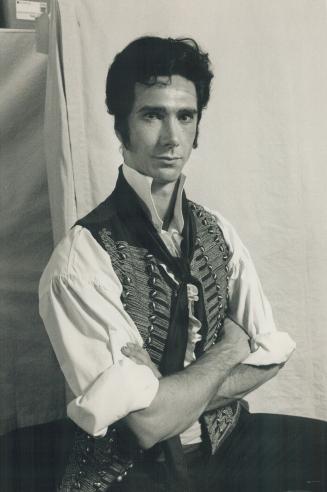 Todd Waite: Plays nine characters, including (from left) a waiter, the major role of enjoiras, a judge and a policeman