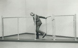 Iain Baxter with his 1967 sculpture Fence, on display at the AGO, as part of a collection of the Vancouver artist's work from 1965 to 1970. AGO curato(...)