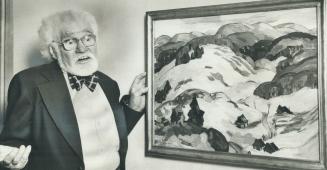 Painter Andre Bieler, 81, offers a description of his canvas, Early Spring In The Laurentians, to a visitor to The Laurentians: Painters In A Landscap(...)