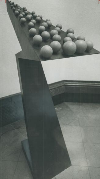 Four pieces of sculpture from the Fifth Guggenheim International Exhibition: above, Inclined Plane With Forty-Nine Spheres (1966) by Pol Bury of Belgium,