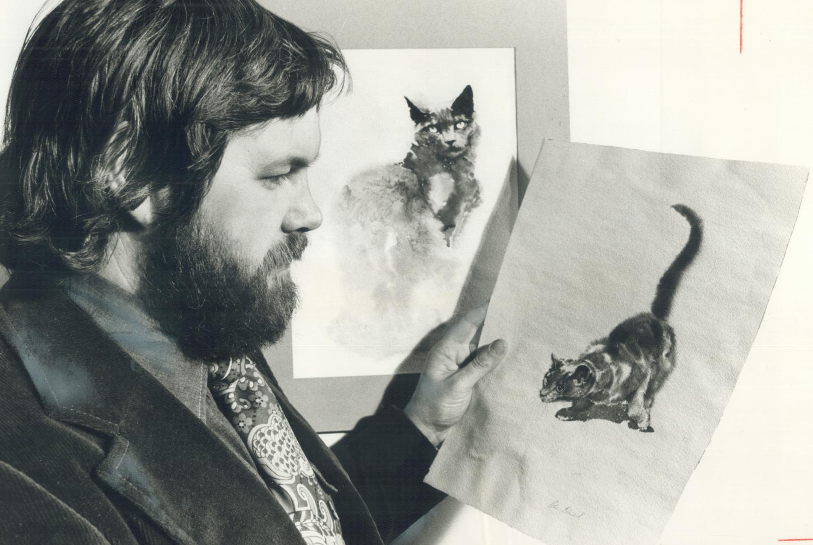 Artist Alan Daniel with two of the delighful cats he created in water colors for the new anthology of poetry In Praise Of Cats. The poems about cats i(...)