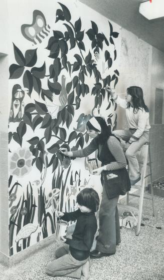 Garden of Eden is theme o mural being painted outside office of North York's Blessed Trinity Separate Schoo