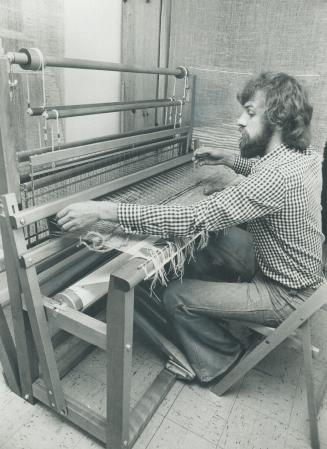 Warping and woofing at his loom fills much of the spare time of commercial artist Jiri Matousek, 26