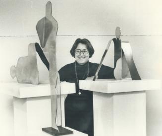 Sculptress Anne Kahane has forsaken wood for the gleaming simplicity of aluminum
