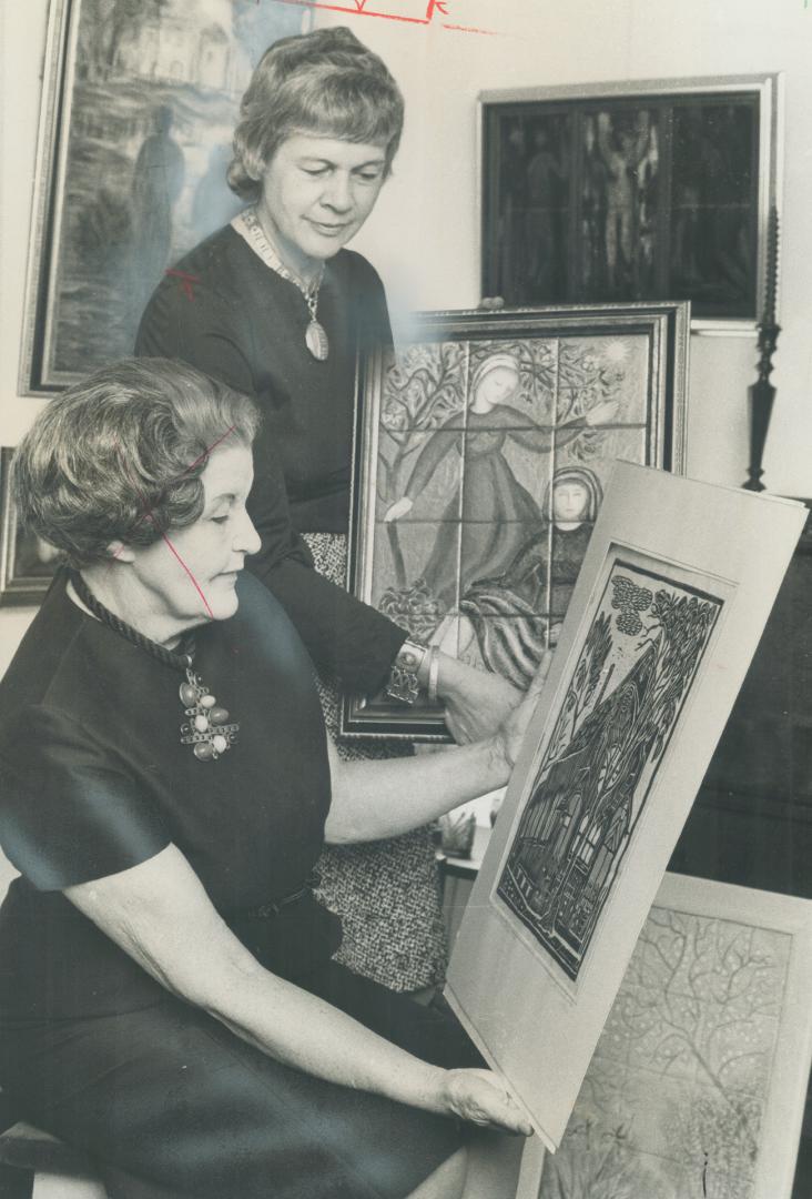 Mrs. Lorna Sheard (seated and artist Bronka Michalowska. Examples of artist's enamelling will be shown at Royal Ontario Museum