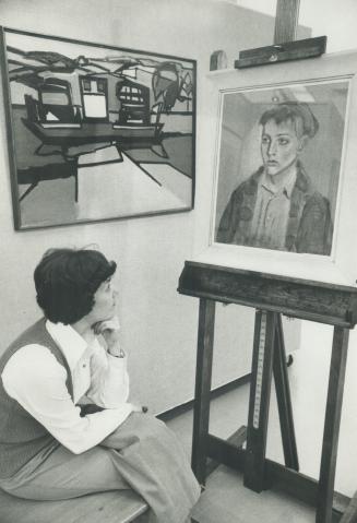 Mrs Judy Scolnik admires the work of the late artist Jack Humphrey at Galerie Dresdnere