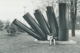 Two views of Nobuo. Kubota's untitled sculpture of black enamelled steel, one of 10 pieces of sculpture in the New Sculpture at Stratford exhibition w(...)