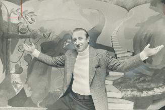 Alex neveroff poses in front of his controversial 500-square-foot mural at O'Neill Collegiate in Oshawa, where Neveroff used to teach. Teachers voted (...)