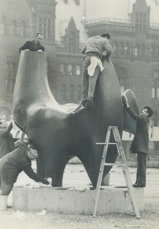 Dawn raiders scrub the archer. City Hall cleaners staged a dawn raid on The Archer today and gave the sculpture its first cleaning since it was put in(...)