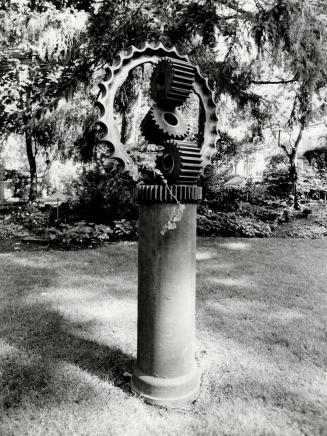 Industrial evolution: This sculpture, made from discarded industrial gears, was created by Clayton Spanton and sits at the home of this parents, Jack and June Spanton