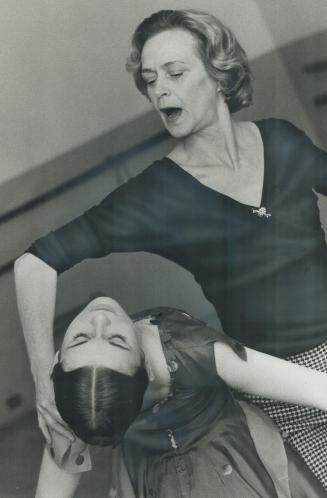 Mme. Diana Jablokova-Vorps shows Diane Mulholland the correct movements for a sequence from L'Amour Sorcier, one of four ballets being presented by th(...)
