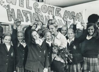 Members of the National Ballet School ran up the flage-a big painted sign-to welcome home Celia Franca and National Ballet dancers at Malton airport y(...)