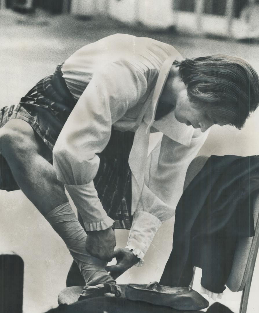 He crocked his andle. . . Ballet dancer Rudolf Nureyev tapes ankle he injured when he slipped in snow while wallking Sunday. Last night he danced in La Sylphide at the O'Keefe Centre