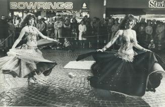 Creating a stir. Belly-dancers Khadijah and Rkija shake things up for shoppers at Scarborough Town Centre's sixth anniversary celebrations last night.(...)