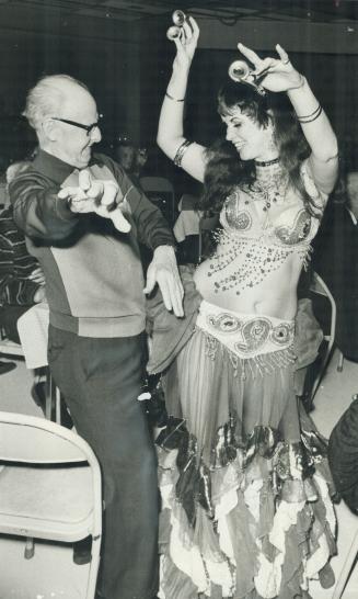 'You put your right hip out....'Harold Nuttall joined belly dancer Princess Natoma for a few twirls on the floor last night at the annual pub and stag(...)