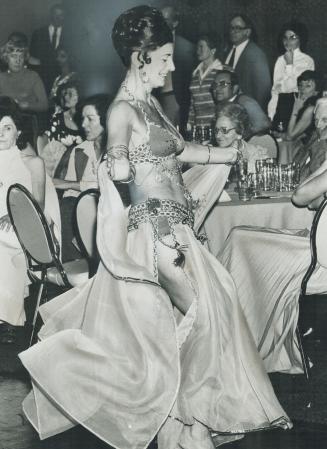 A Gyrating Graduation. Christmas party held by the belly-dancing classes at North York YMCA last night at the Holiday Inn inton Ave. E. included an ho(...)