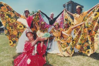 Caribbean dazzle: Janine Jeffers, 9, front, and others in Afro-Caribbean Dance Ensemble twirl in Trinidadian garb on weekend at Seneca Village Centre