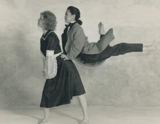 Fantastic leap: Yvonne Ng, a founder of Dance Allegro, defies gravity with Michelle Farwell