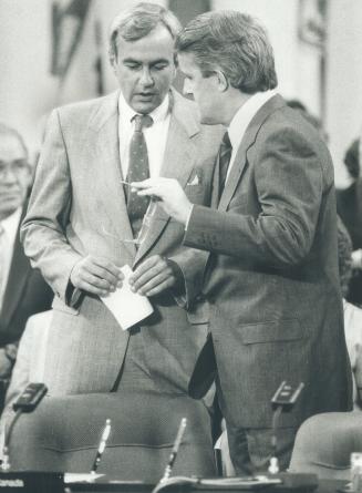 Friends then: Premier Peterson, left, and Prime Minister Mulroney were buddies when Meech Lake accord was signed but may not be so friendly after PM reports on trade deal Tuesday