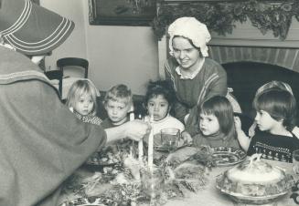 Youngsters from York University day care centre, watch Christmas preparations at Black Creek Pioneer Village