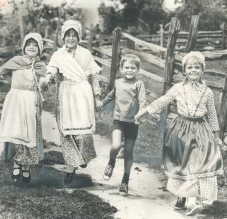 Children romp at the restored 19th century Black Creek Pioneer Village