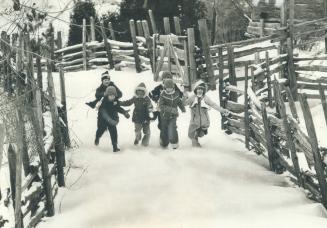 A romp in the snow at Black Creek Pioneer Village was fun yesterday for youngsters from Oliver Baptist Church in Toronto