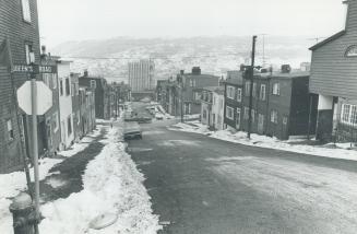 St. John's NFLD, Looking toward harbour showing new Royal Trust Bldg and old houses