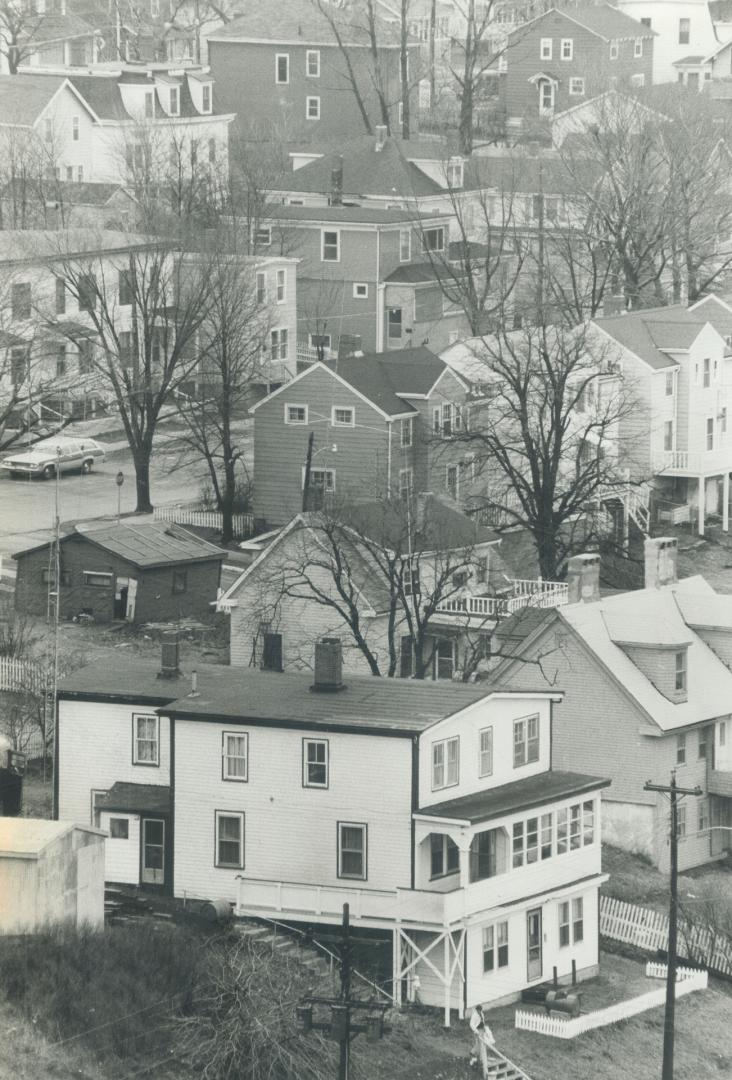 Compact, conservative and congenial ? that's Halifax with its distinctive wooden houses and thriving harbor