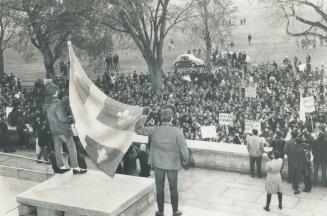 Many Quebeckers, like these students protesting the 1969 law giving equal status to French and English in Quebec, fear that bilingualism means the end of French