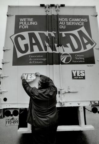 Lorry Lobby, Gord Thompson decorates his truck for Ontario Truckers Association's pro-Yes convoy yesterday in Metro Toronto