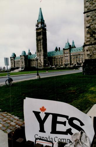 In the dumpster: A Yes sign sits in a garbage bin on Parliament Hill yesterday, a day after voters trashed the unity deal