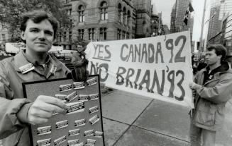 He's pushing a button for yes, York University history student Daniel Robinson has spent $322 on 250 buttons with the message: Don't let anger at Prim(...)