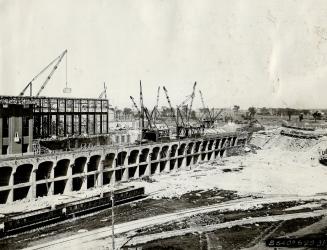 Here is view of power house of the Beauharnois Power Company under construction at Lake St