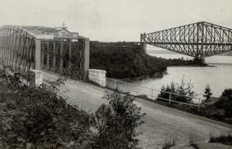 The opening of an auto highway across the famous Quebec Bridge near Quebec was hailed by motorists, as it does away with the use of the ferries betwee(...)