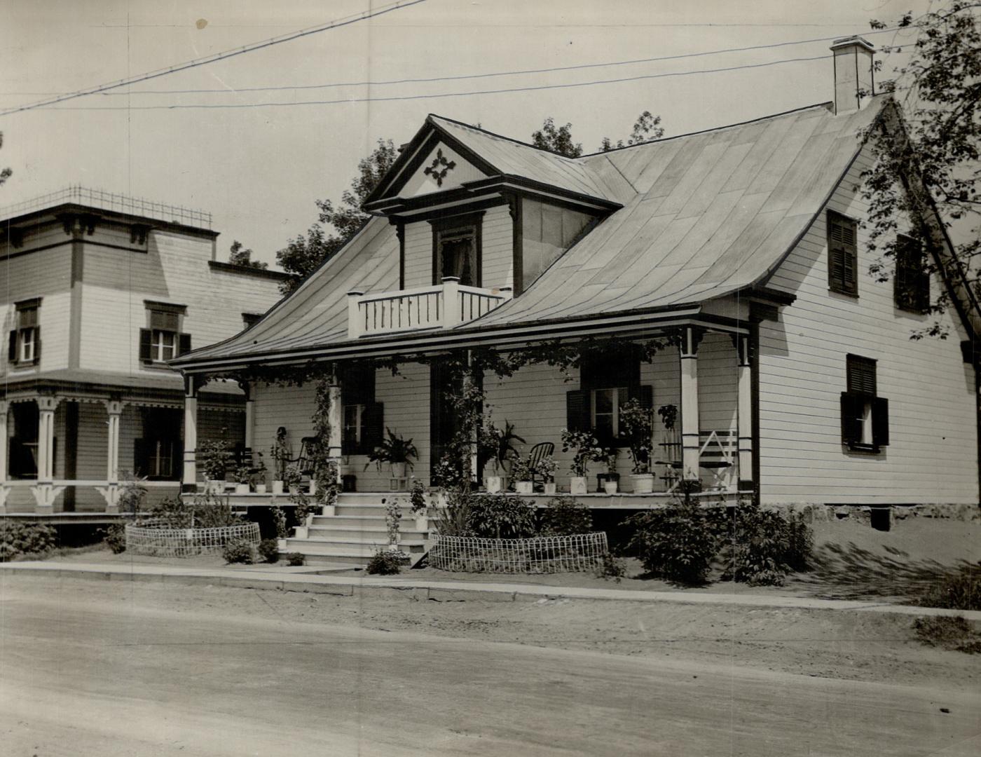 Quebec Topical House in a village