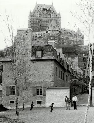 Copper-Roofed Chateau Frontenac rises dramatically above Old Quebec's fortifications