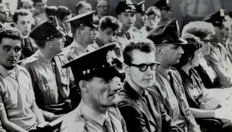 Policemen Guard FLQ Terrorist suspects at Inquest into death of bombing victim, But FLQ terrorists aren't the real enemy of confederation in Quebec - they're merely playing tragically with violence