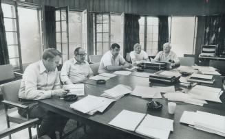 Members of the legislature committee on economic and cultural nationalism prepare their final report in the oval sunroom of the Ontario Government Sta(...)