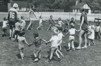 Atkinson Foundation report at Bolton Camp Which receives grant from foundation Kiddies enjoy supervised play Ring around the rosie