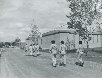 Ontario training centre Brampton boys walk freely from classrooms to cottage style dormatories's