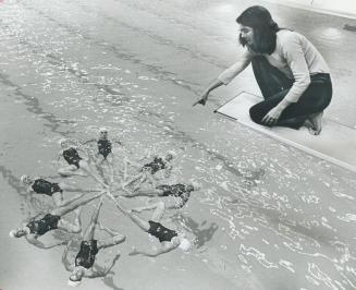 You've got it, Getting a bird's-eye view of her synchronized swimmers, Joan Manwaring, and instructor with the Olympium Synchronized Swimming Club use(...)