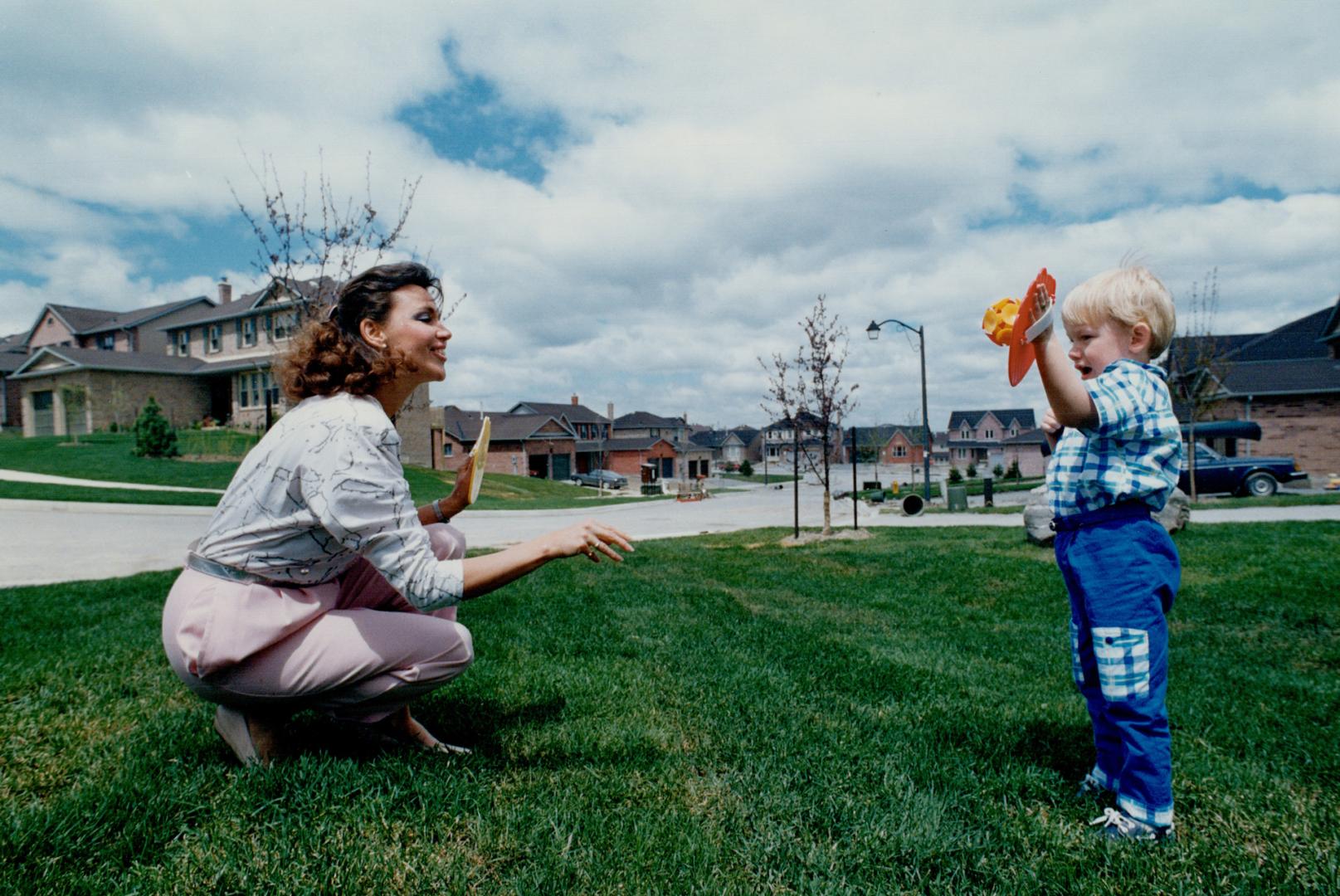 Janice Mitchell plays with her son Bretton, 2, at their Aurora home