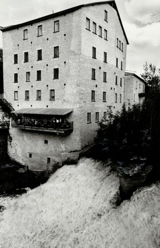 Spine-tingling view of a foaming cataract is offered from this veranda anchored firmly to one of the five-foot-thick walls of the Elora Mill Inn, one (...)