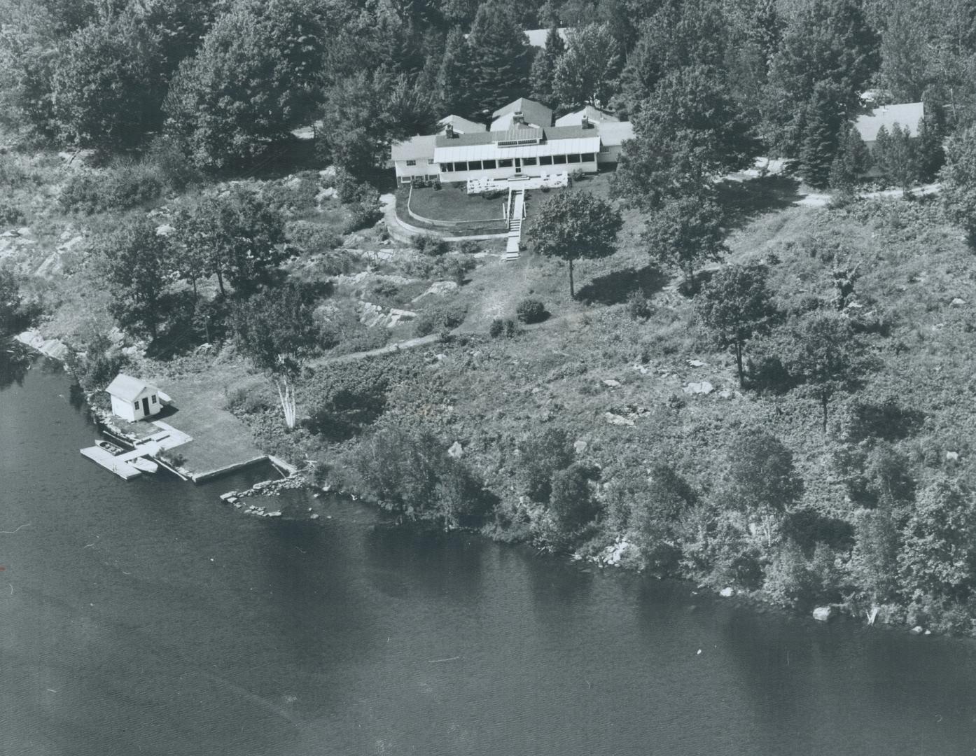 A handsome cottage sits in splendid isolation on a lake in Longford Reserve