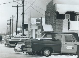 The hub of a boom town, the main street of Nakina in northern Ontario is lined with vehicles - one sign of the new life being pumped into the town by (...)