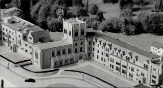 Master plan for buildings and grounds, another part of which is shown in this model, was announced by R