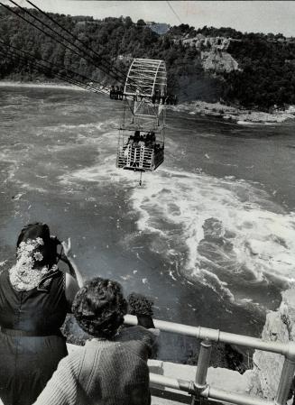 Niagara Falls cable car ride provides a great view, Helicopter flights are available if you want an even greater thrill