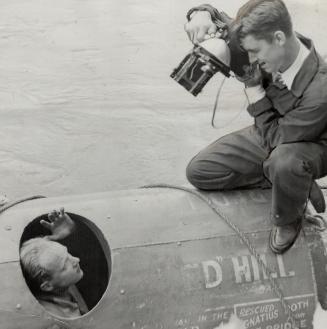 Photographing Red inside the barrel is Ray Munro, Daily Star photographer