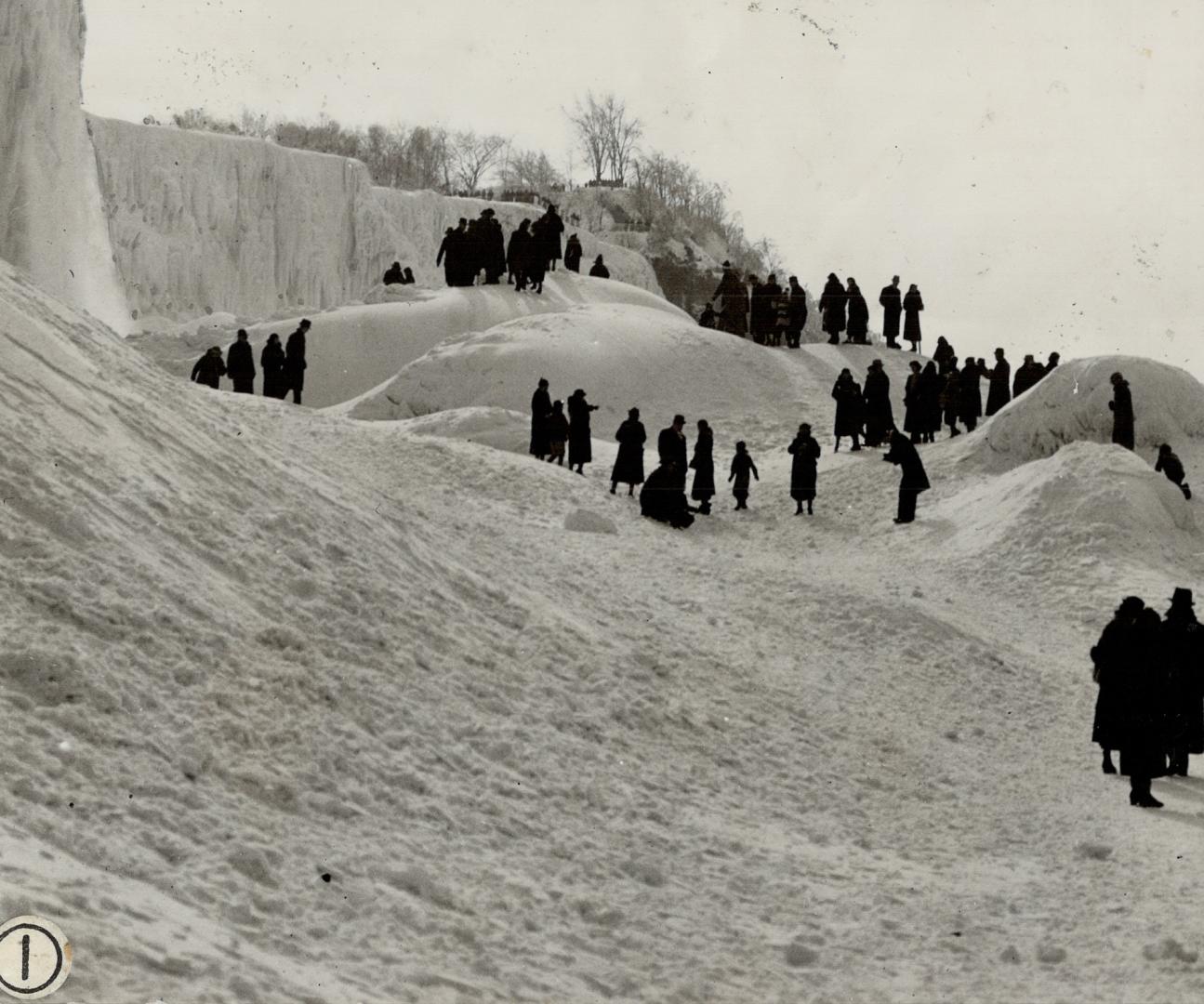 King winter transforms Niagara Falls into F, Mighty Niagara has become the abode of the ice king and the roaring waters are now gigantic, glastening formations of ice