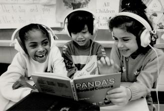 Special programs: Kiwana Willis, 6, left, Lee Do, 6, and Sana Khatib, 6, benefit from special attention to pupils' ethnic needs